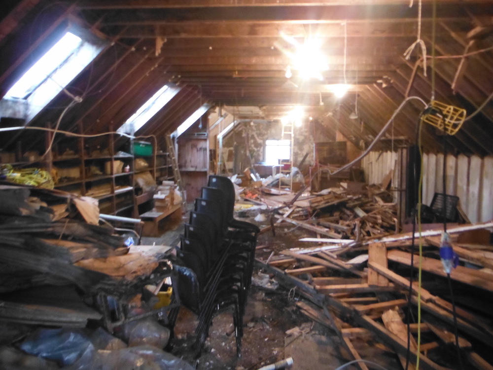 Derelict upper floor before clear out.